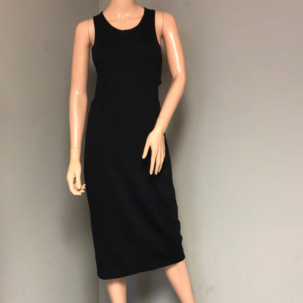 Askari Below the knee sexy black dress. Size S